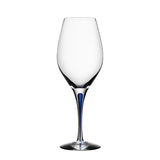 A clear Orrefors wine glass with a blue-tinted slender stem, part of the elegant Intermezzo Blue collection, called the Intermezzo Blue Wine Balance Glass 14oz.