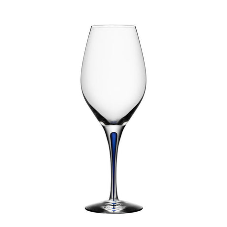 A clear Orrefors wine glass with a blue-tinted slender stem, part of the elegant Intermezzo Blue collection, called the Intermezzo Blue Wine Balance Glass 14oz.