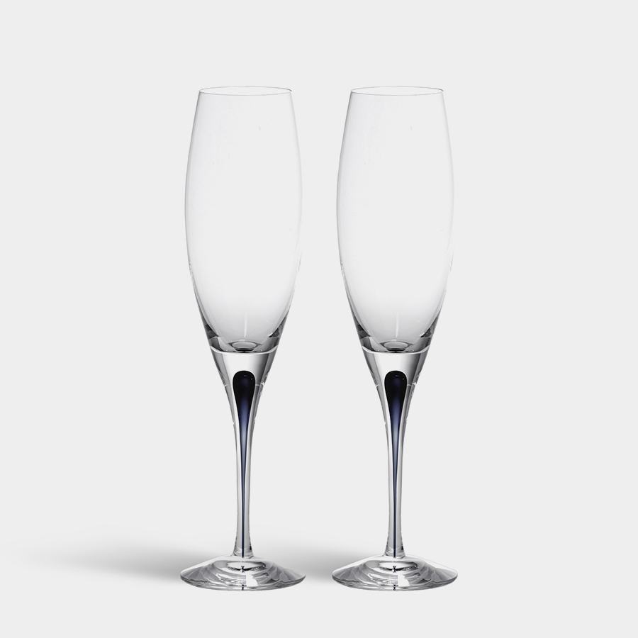 Two Orrefors Intermezzo Blue Flute Glasses, 7oz each, are elegantly placed together against a plain white background. Designed by Erika Lagerbielke, they feature elongated stems. (2-Pack).