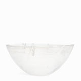 The KostaBoda Contrast Bowl, designed by Anna Ehrner, showcases elegant white glass with striking blue and black veining, set against a plain white background.
