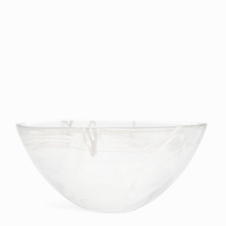 The KostaBoda Contrast Bowl, designed by Anna Ehrner, showcases elegant white glass with striking blue and black veining, set against a plain white background.