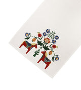 The Table Runner: Dala Horse and Kurbits (40x120cm) features white fabric with two red Dala horses and colorful flowers—perfect for adding Swedish folk art charm to your Scandinavian décor.