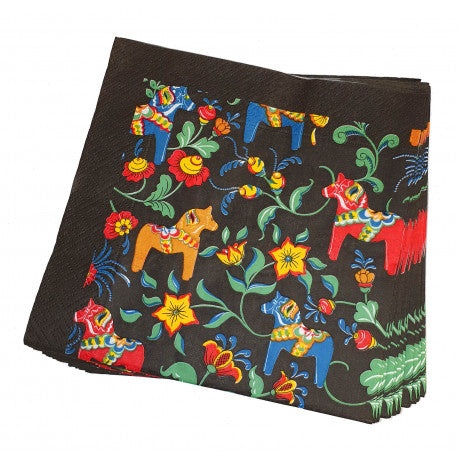 Black napkins featuring colorful orange, red, and blue Swedish Dala horses with Kurbits designs.