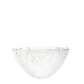 The KostaBoda Contrast Bowl, designed by Anna Ehrner, showcases white glass with striking blue and black veining, pictured against a plain white background.