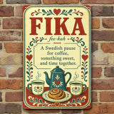 Swedish fika sign displayed on a brick wall, featuring illustrations of coffee, pastries, and floral patterns in red, blue, and yellow.