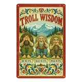 Scandinavian-style sign featuring three trolls in see no evil, hear no evil, speak no evil poses by mountains, with “Troll Wisdom” text, flowers, and heart motifs.