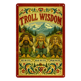 Metal sign depicting three trolls performing see-no-evil, hear-no-evil, and speak-no-evil, set against a mountain landscape with Nordic decor and kurbits floral borders.