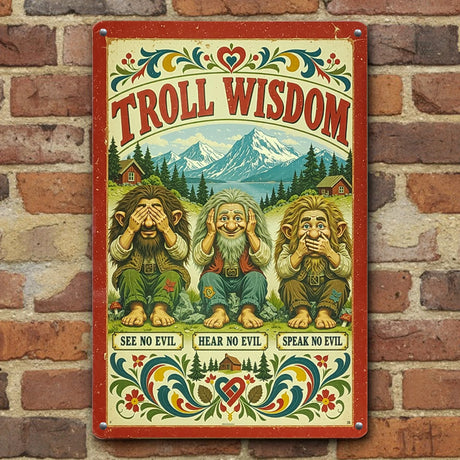 Scandinavian metal sign featuring three trolls posing see no evil, hear no evil, speak no evil with kurbits floral accents and mountains in the background, mounted on brick.