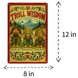8 by 12-inch rectangular metal sign featuring three trolls in see no evil, hear no evil, speak no evil poses, kurbits floral borders, and the text Troll Wisdom.
