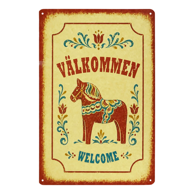 Swedish metal welcome sign displaying “Välkommen” and “Welcome,” with a central painted Dala horse and surrounding floral designs.