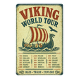 Aluminum sign featuring a vintage-style Viking ship with dragon prow, tour stops by country and year, and the text “Viking World Tour” in bold at the top.