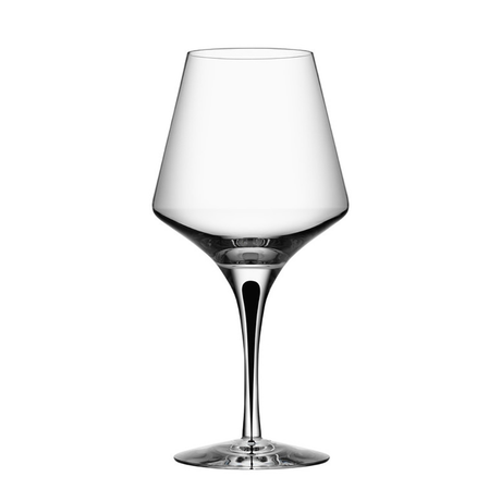 The Orrefors Metropol Red Wine Glass, 20.5oz clear glass with black inside the stem, designed by Erika Lagerbielke, stands upright against a plain white background.