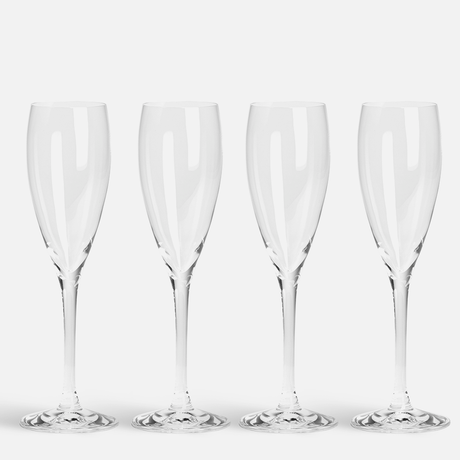 Four Orrefors: More Champagne glasses (4-Pack, 6 oz) are arranged in a row against a plain white background.