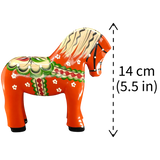 The Dala Horse: Red Swedish Dala Horse "Färnäshästen" by Nils Olsson is a handcrafted 14 cm (5.5 in) folk art piece from Sweden, decorated with traditional floral patterns.