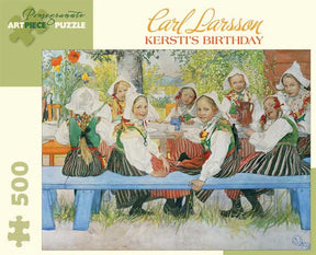 The product, "Puzzle: Carl Larsson Kersti’s Birthday (500 Pieces)," showcases the artwork "Kersti's Birthday" by Carl Larsson, depicting children in traditional attire gathered around a table outdoors. This 500-piece jigsaw puzzle is ideal for both art lovers and puzzle enthusiasts.