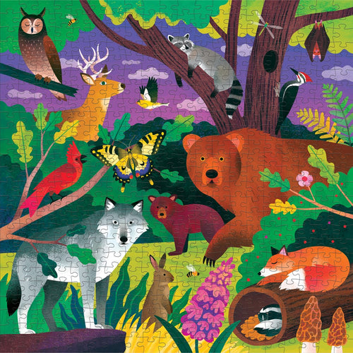 Dive into the enchanting world of the Puzzle: Forest Illuminated Glow in the Dark 500 pc Puzzle, showcasing an illustrated scene with a bear, wolf, fox, raccoon, owl, and deer among lush trees and plants. Reveal hidden glowing details as you piece together this magical forest in a captivating family activity.