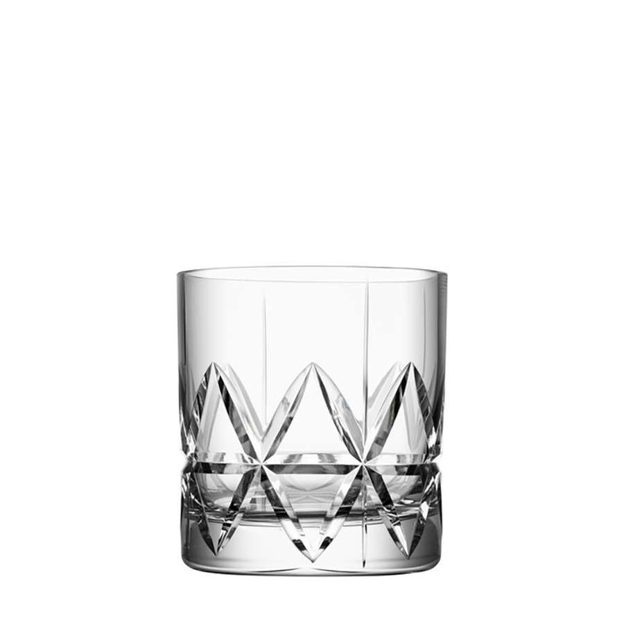 A clear glass tumbler with a geometric pattern on the lower part, similar to an Orrefors bar glass design, is highlighted against a white background. Product: Orrefors: Peak Old Fashioned Glass (4-Pack).