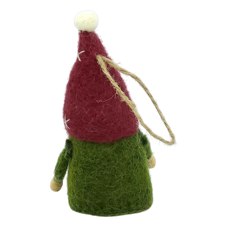 A hand-felted tomte gnome ornament with a tall red hat, green body, and wooden hands hanging by a string loop on a white background.