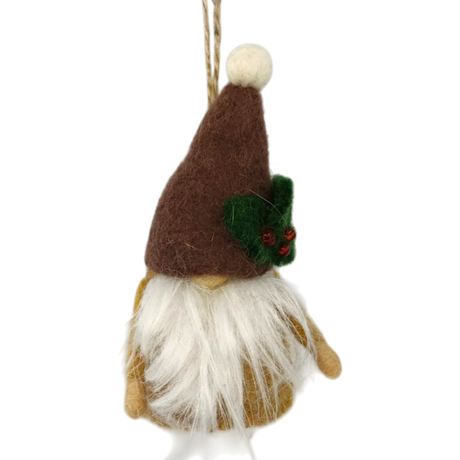 Hand-felted tomte gnome ornament with a brown hat, white beard, and holly accent, hanging by a string against a white background.