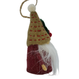 Hand-felted Scandinavian tomte gnome ornament with a tall tan hat, white beard, red body, green accents, and a loop for hanging.