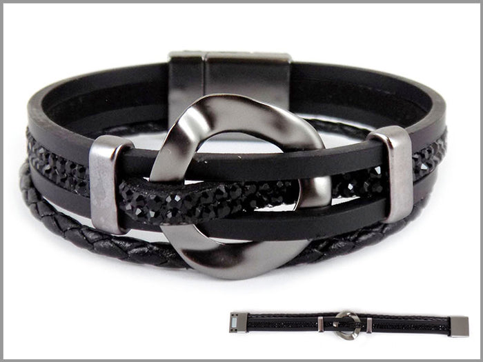 The Bracelet: 4 Strand Hammered Circle features black braided and smooth leather bands, a nickel-free hammered metal circle centerpiece, and a secure magnetic clasp.