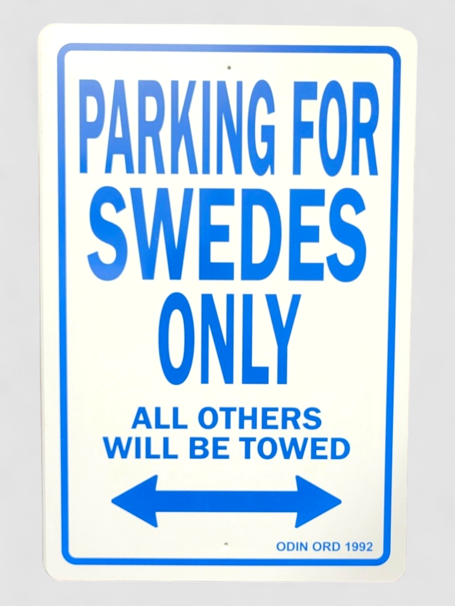 The weather-resistant product, "Sign: Parking for Swedes Only," boldly declares PARKING FOR SWEDES ONLY. ALL OTHERS WILL BE TOWED, complete with an eye-catching arrow underneath that makes it a true conversation starter.