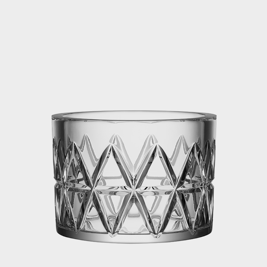 A clear Orrefors crystal bowl with a geometric patterned design named the Peak.