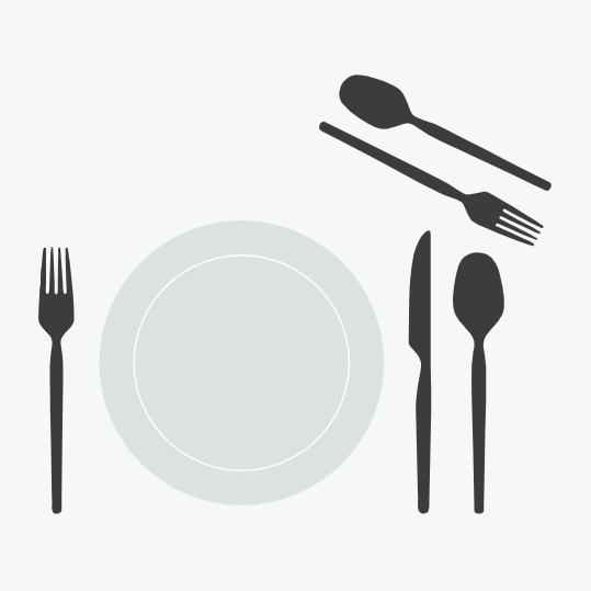 A refined place setting features the Gense - Silver Dining Set CPB 2091: a plate with a fork on the left, knife and spoon on the right, and an elegant fork and spoon above.