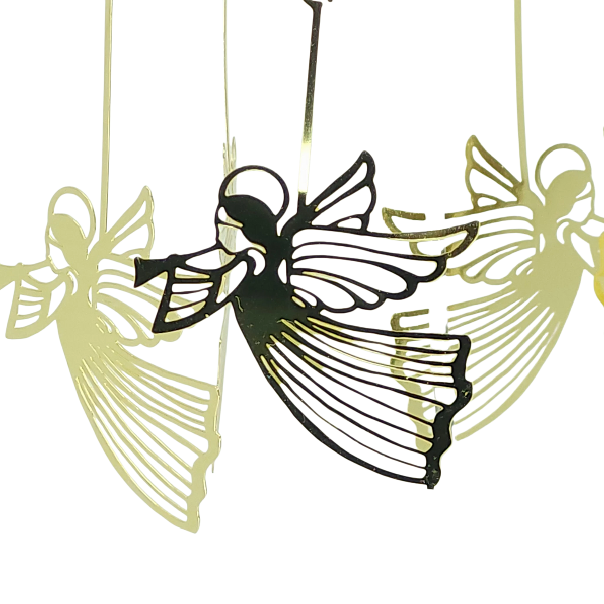 Four gold Scandinavian-style angel ornaments with wings and trumpets hang suspended; one appears darker in front, while three lighter ones are blurred in the background.