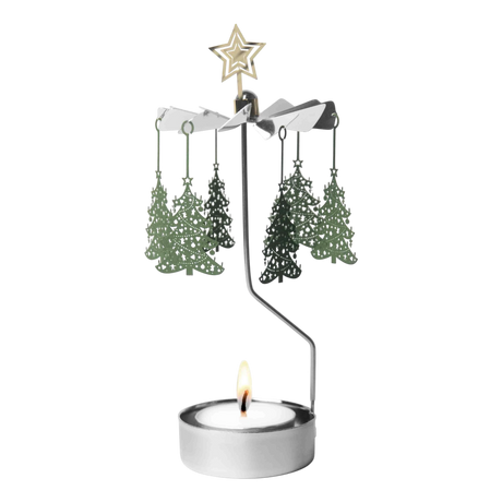 Metal rotary candle holder carousel with Christmas tree-shaped ornaments and a star topper, spinning above a lit tealight candle, on a white background.