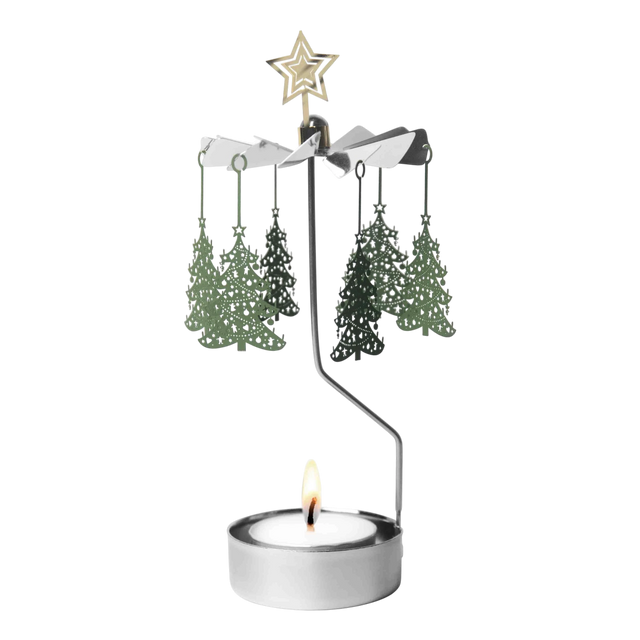 Metal rotary candle holder carousel with Christmas tree-shaped ornaments and a star topper, spinning above a lit tealight candle, on a white background.
