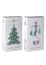 Two Angel Chimes boxes; front box features a green Christmas tree, back box shows the assembled rotary candle holder with tealight and spinning angel figures.