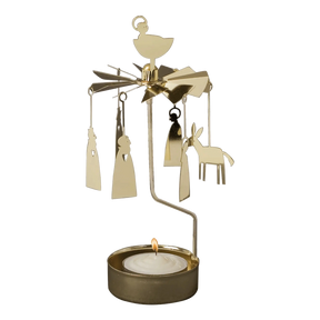 Gold-tone metal Swedish candle carousel featuring hanging Nativity figures, a star topper, and a burning tea light in the base.