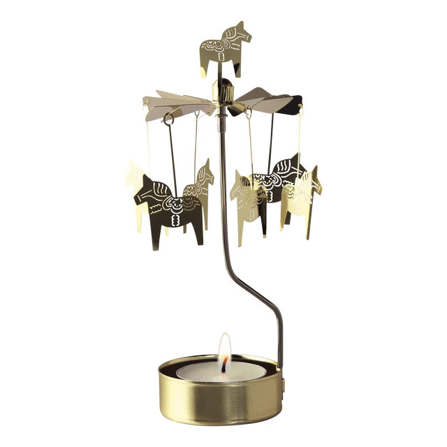 Gold Swedish rotary candle holder with Dala horse silhouettes and a lit tea light.