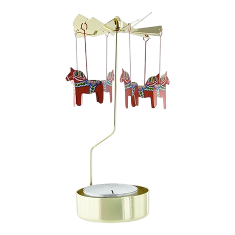 Gold-toned metal Swedish rotary candle holder with hanging red Dala horses featuring blue and white rosemaling patterns.