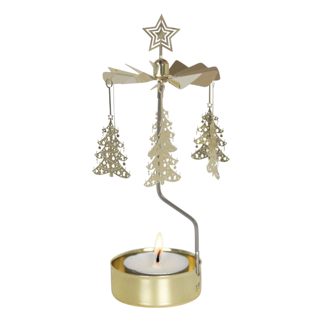Gold rotary candle holder with star-topped Christmas tree-shaped ornaments spinning above a lit tealight. Plain white background.