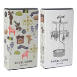 Two boxes of Scandinavian angel chimes; one features Swedish-themed illustrations, the other shows a silver angel chime with a tealight placed below it.
