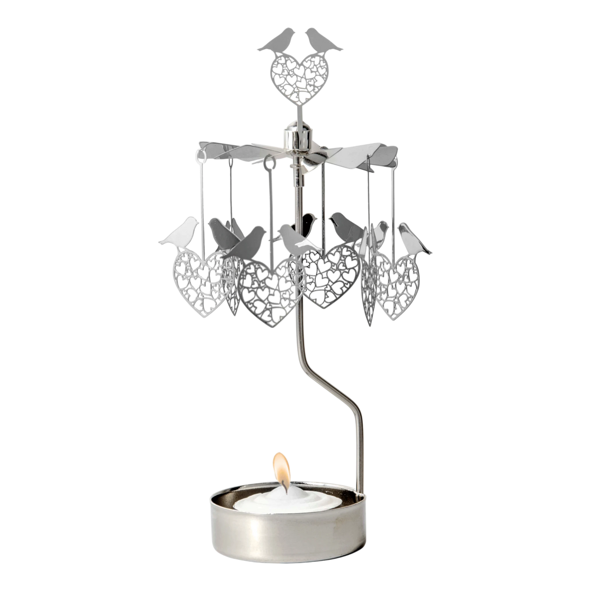 Rotary candle holder with love bird and heart shapes suspended above a lit tealight, all crafted from silver-toned recycled metal.