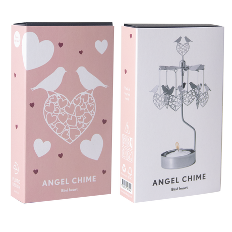 Two pink and white boxes labeled “Angel Chime Bird Heart” with love bird and heart graphics; one box displays a rotary candle holder assembled above a tealight.