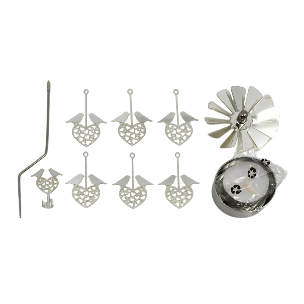 Silver rotary candle holder with six heart-shaped ornaments featuring love birds, a bent metal rod, clamp, fan-like spinner, and a round base made of recycled metal.