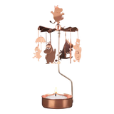 Rose gold candle carousel with metal Moomin family and animal figures hanging above a tealight holder, arranged in a circle to spin from heat.