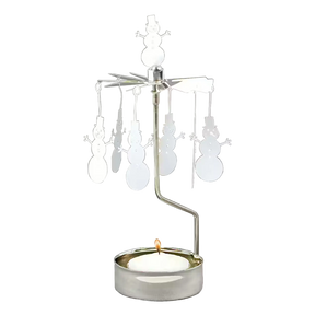 Silver-tone metal rotary candle holder with dangling snowman silhouettes and a lit tea light.
