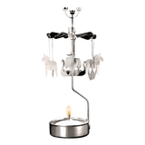 A silver-toned metal rotary candle holder with hanging Dala horse and Viking ship ornaments, featuring a lit tea light at the base.
