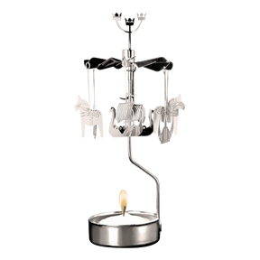 A silver-toned metal rotary candle holder with hanging Dala horse and Viking ship ornaments, featuring a lit tea light at the base.