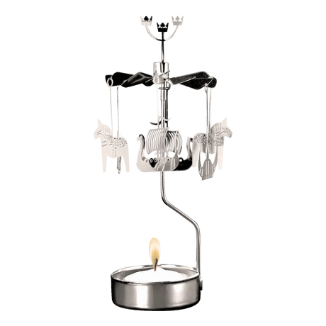 A silver-toned metal rotary candle holder with hanging Dala horse and Viking ship ornaments, featuring a lit tea light at the base.