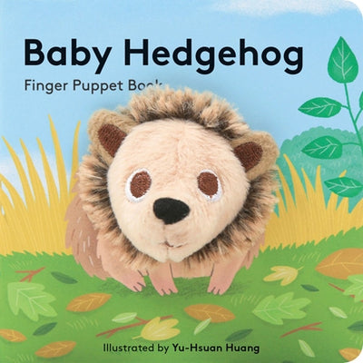 Cover of the "Book: Baby Hedgehog (Finger Puppet Book)" showcasing a soft finger puppet nestled among grass and leaves, with illustrations by Yu-Hsuan Huang.