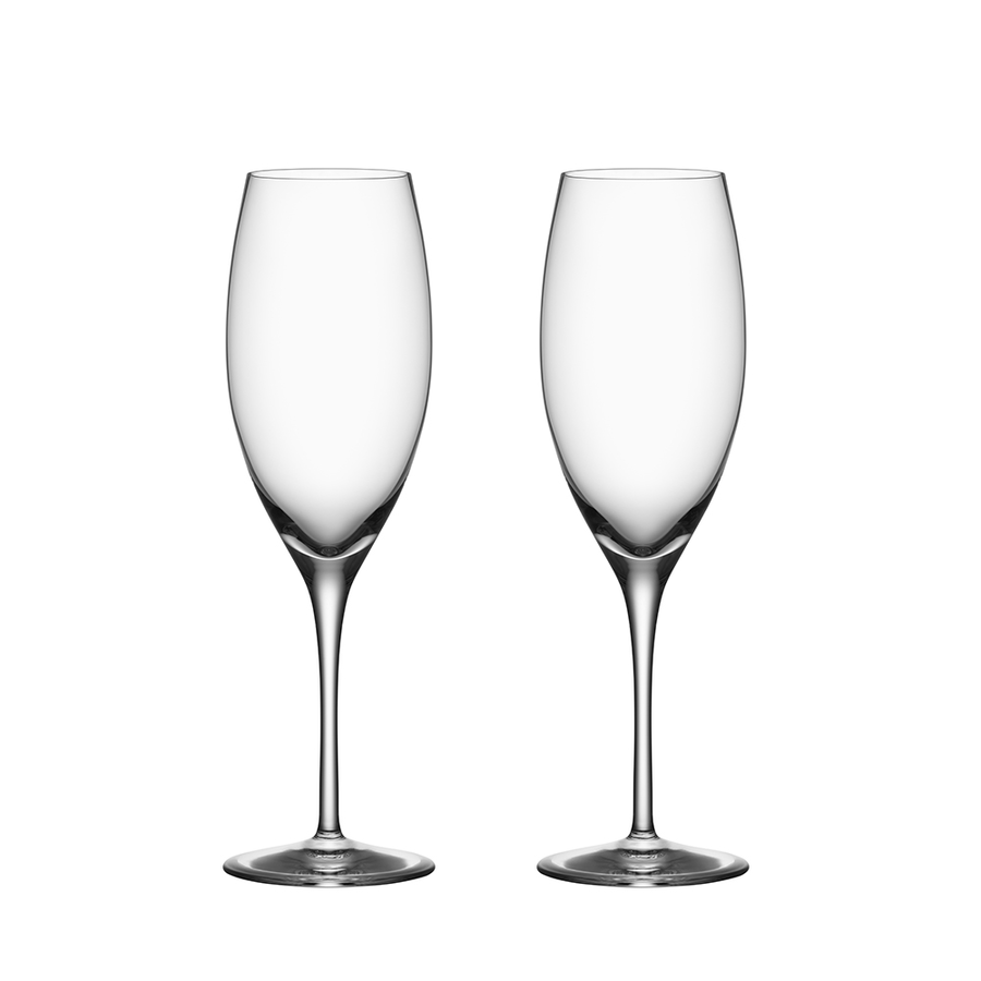 The Orrefors Premier Champagne Glass 10oz (2-Pack) showcases two elegant, mouth-blown glasses with long stems, perfectly set against a pristine white background, ready to celebrate the finest sparkling wines.