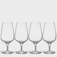 Four clear Orrefors Pulse Beer Glasses (18.5oz, 4-pack), designed by Ingegerd Raman, showcase Scandinavian simplicity as they stand in a row against a plain white background.