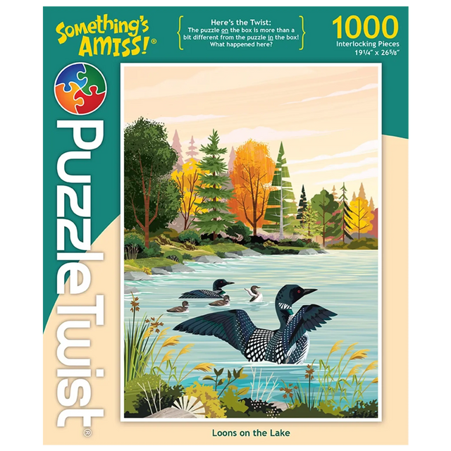 1000-piece puzzle showing Minnesota loons swimming on a lake beneath pale clouds, with trees in fall colors. Artwork by Tim Chapman visible on the box.