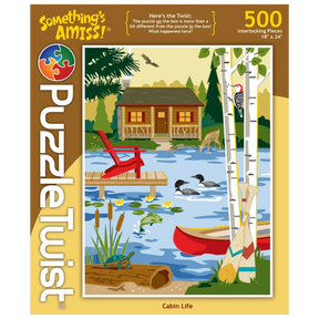 500-piece puzzle showing a lakeside cabin surrounded by trees, with a canoe on the water, woodpecker on a tree, ducks swimming, fish, frog, and turtle visible.